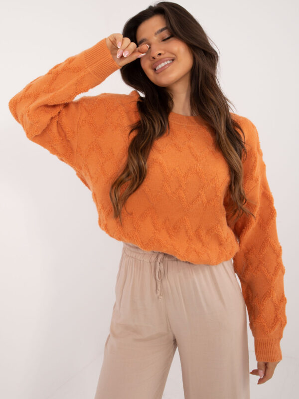 pol_pl_Pomaranczowy-damski-sweter-oversize-we-wzory-408963_1